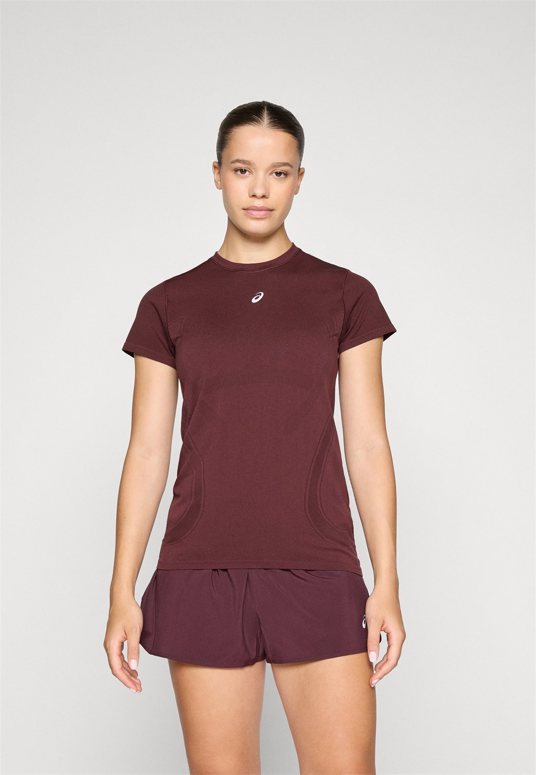 ASICS ROAD SEAMLESS TOP - Sport T-Shirt - rubble red/bordeaux