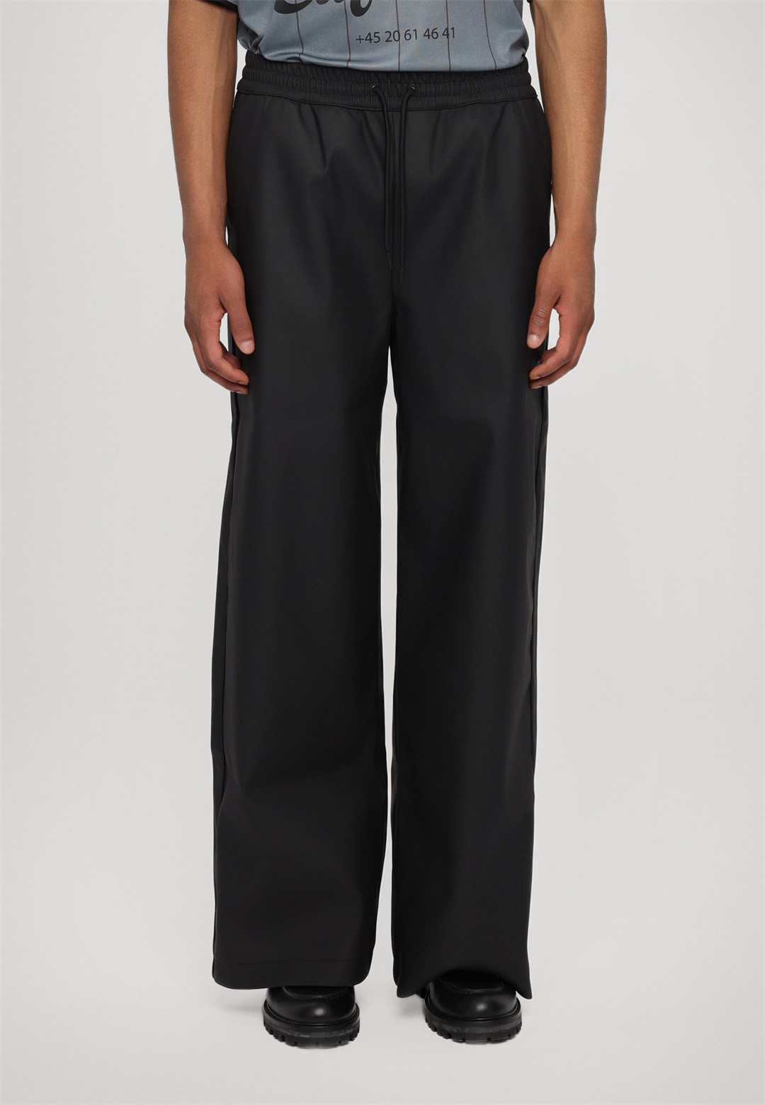 Han Kjøbenhavn RELAXED TRACK TROUSERS - Stoffhose - black/schwarz