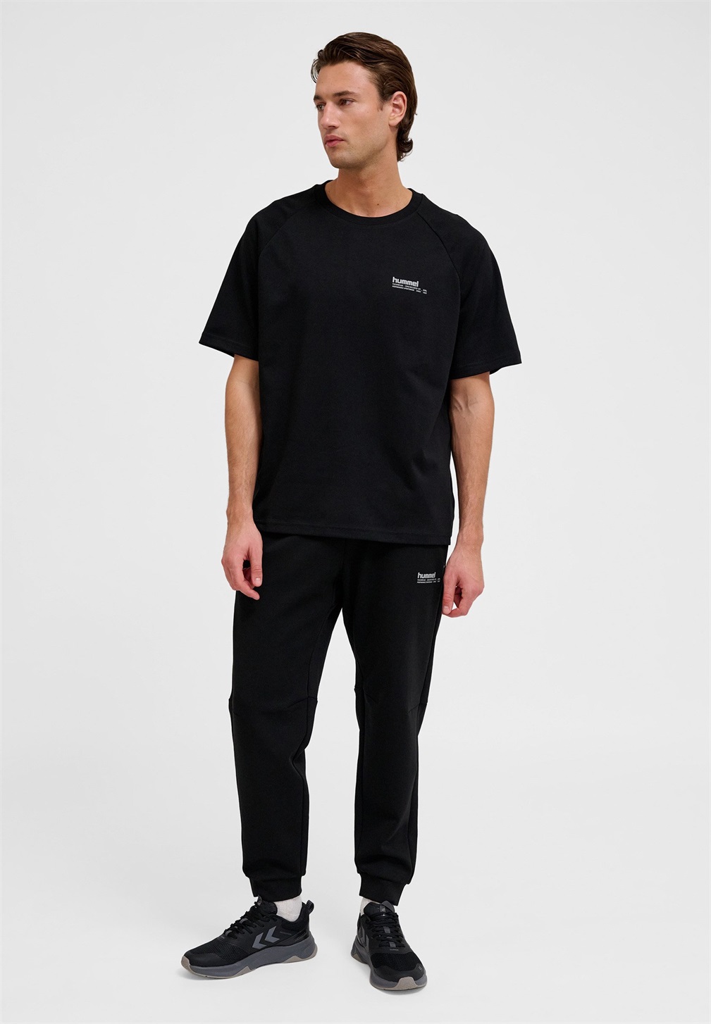 Hummel HMLTECH LOOSE BEE COOL - Sport T-Shirt - black/schwarz