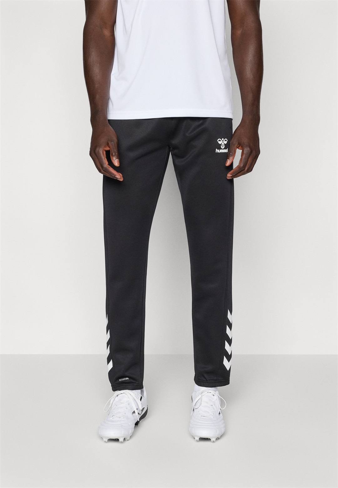 Hummel HMLCORE PANTS - Jogginghose - black/schwarz