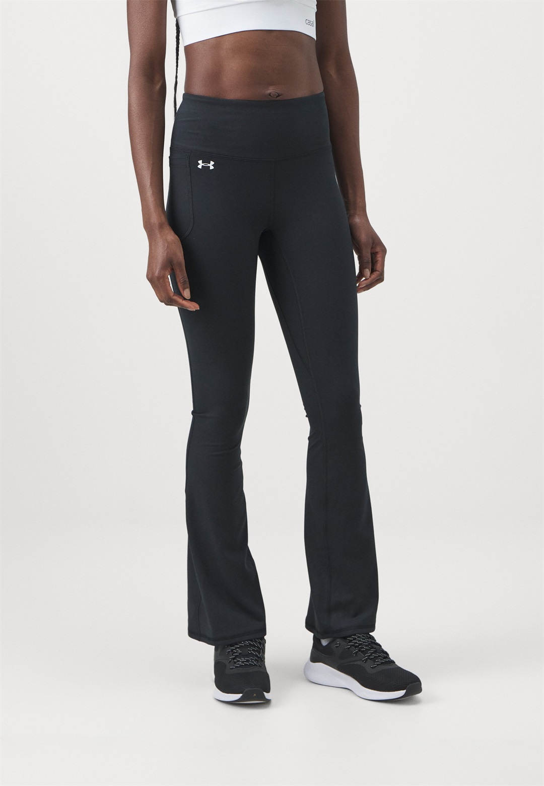 Under Armour MOTION FLARE PANT - Tights - black/schwarz