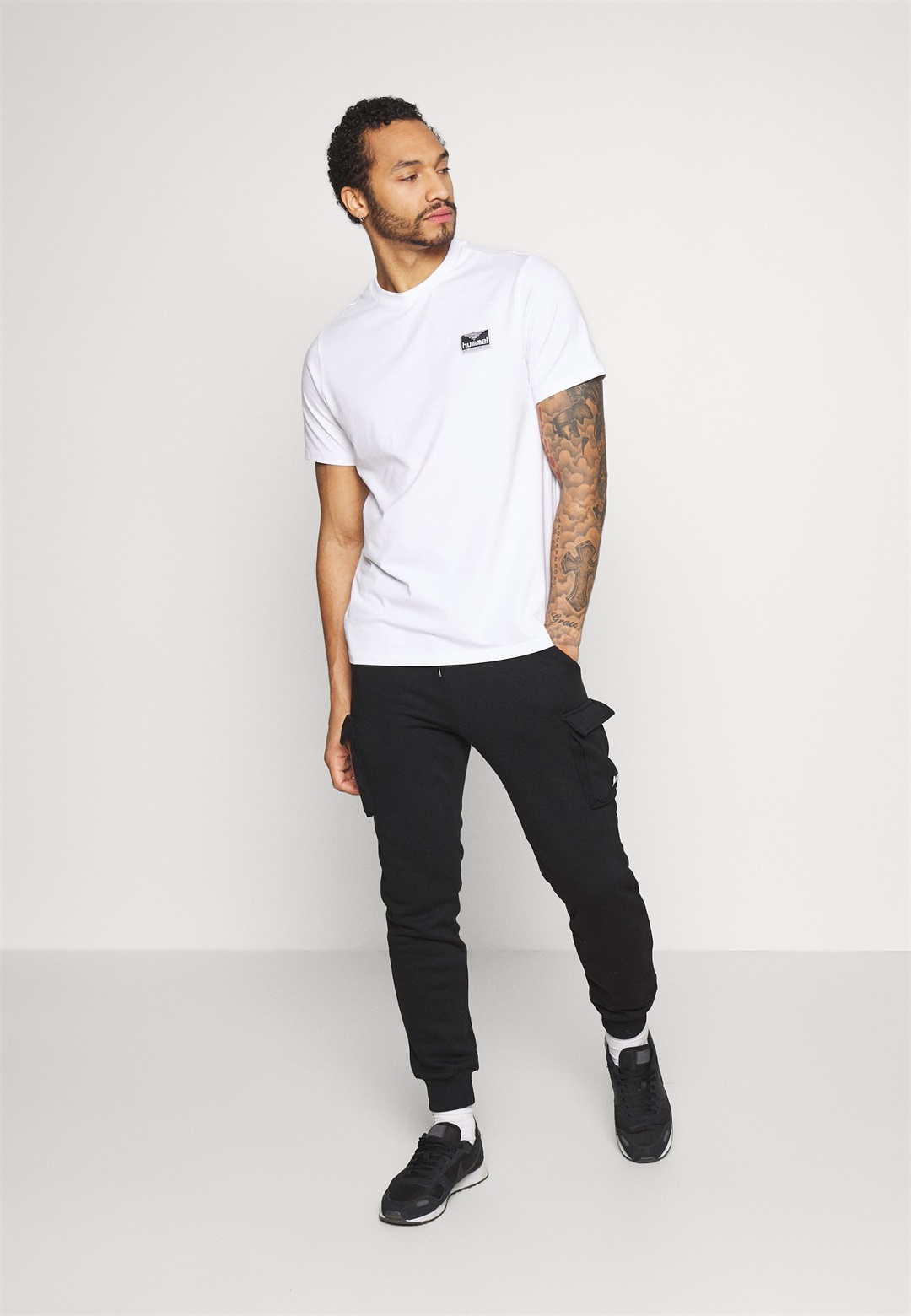 YOURTURN UNISEX - Jogginghose - black/schwarz